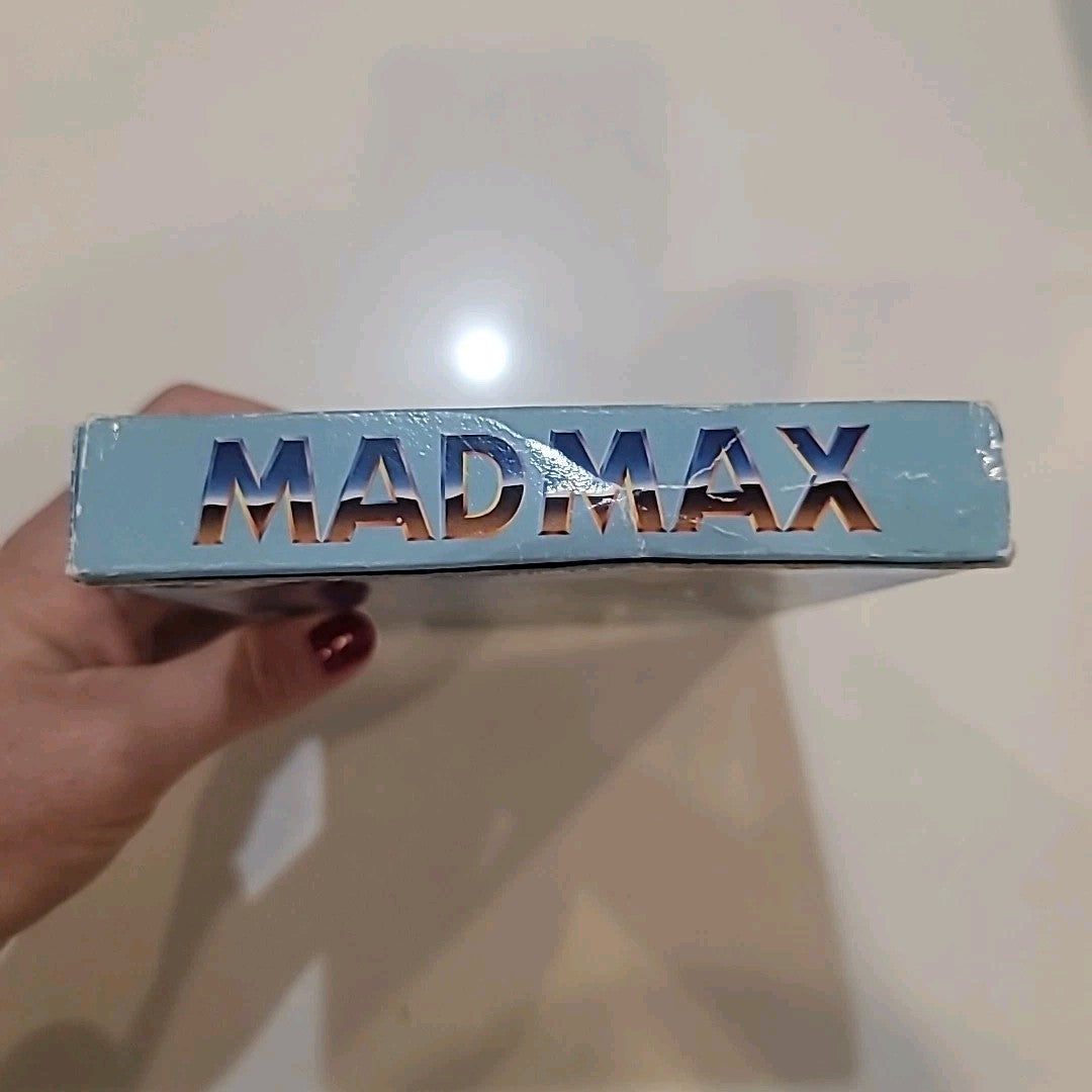 Mad Max Nintendo NES Complete Game with Box and Manual Plastic Sleeve