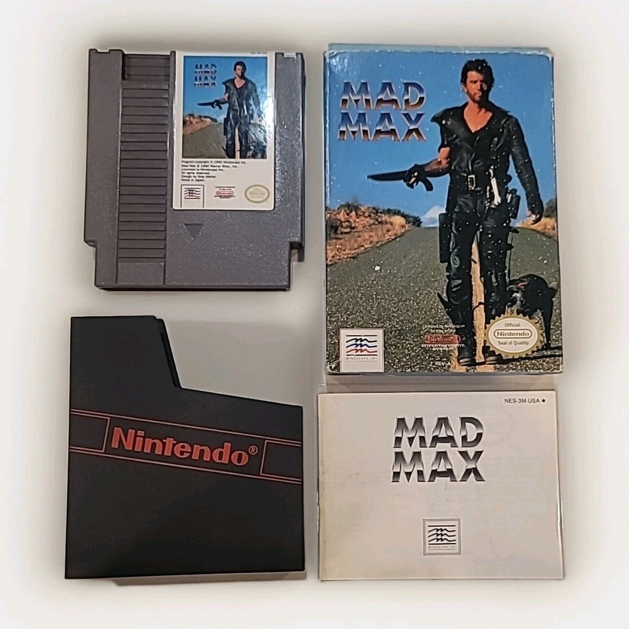 Mad Max Nintendo NES Complete Game with Box and Manual Plastic Sleeve