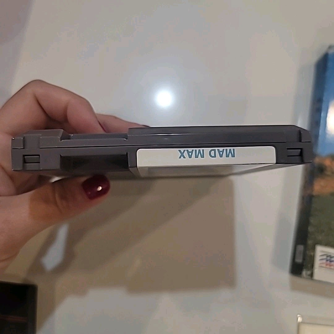 Mad Max Nintendo NES Complete Game with Box and Manual Plastic Sleeve