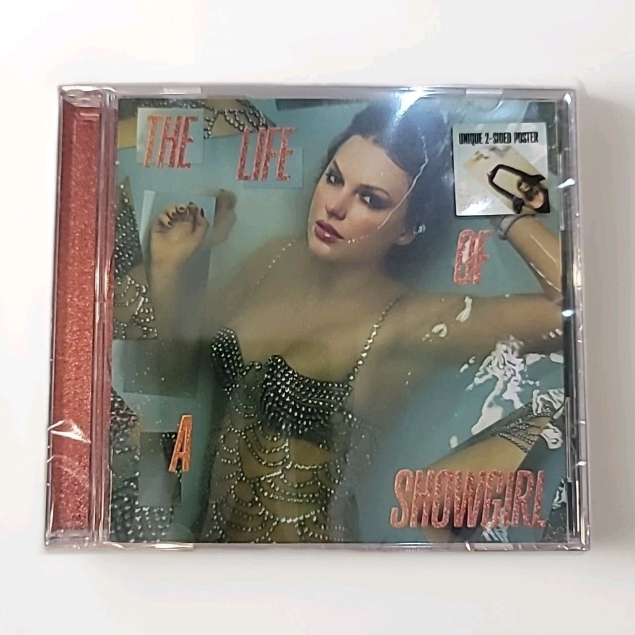 TAYLOR SWIFT - THE LIFE OF A SHOWGIRL.2025 CD: WITH 2 SIDED POSTER. NEW/SEALED.